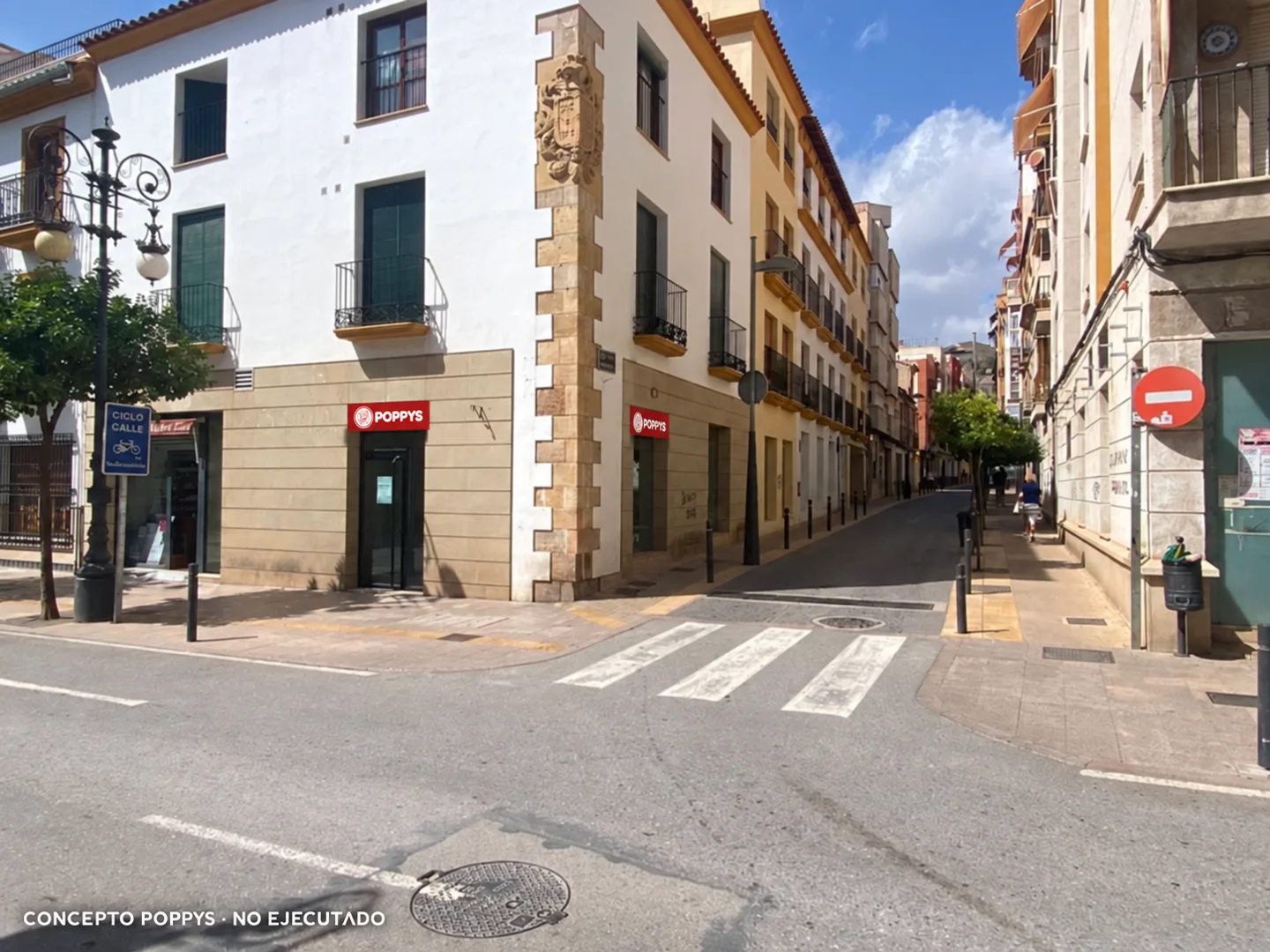 Concepto POPPYS sobre foto de una fachada en Lorca